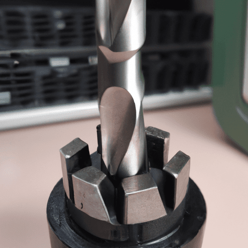 What angles are there on a drill bit that have to do with chipping?